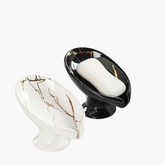 Détail du système de drainage du porte-savon céramique feuille
