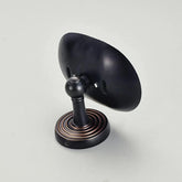 Vue détaillée du porte-savon bronze antique montrant la texture patinée et la finition Oil Rubbed Bronze artisanale
