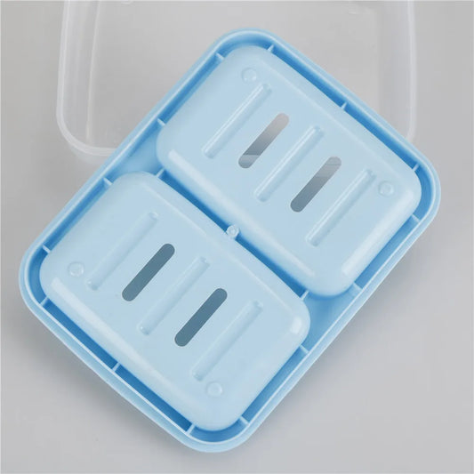 Porte-savon en plastique bleu avec deux compartiments 
